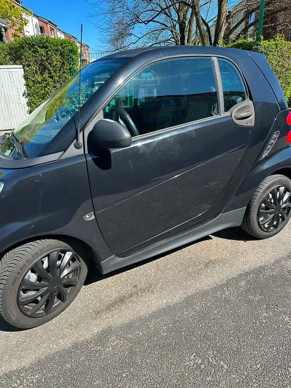 Gebraucht Smart ForTwo Coupé 61 PS (44 kW) 2012 Schwarz Coupé