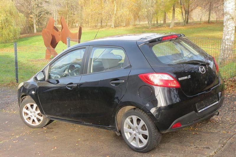 Gebraucht Mazda 2 Impuls 75 PS (55 kW) 2009 Schwarz Limousine
