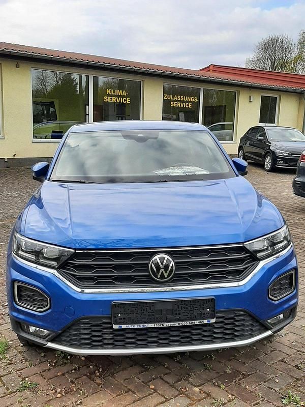 Ravennablau metallic Gebraucht 2021 VW T-Roc Sport SUV | 24.850 € (Guter Preis) - Bild 1/4