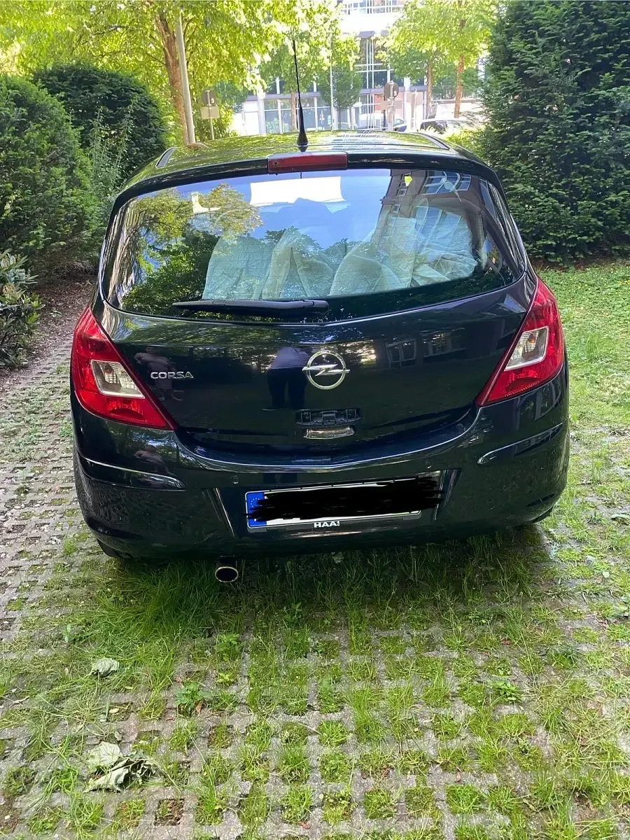 Używany Opel Corsa 87 KM (63 kW) 2013 Czarny Hatchback