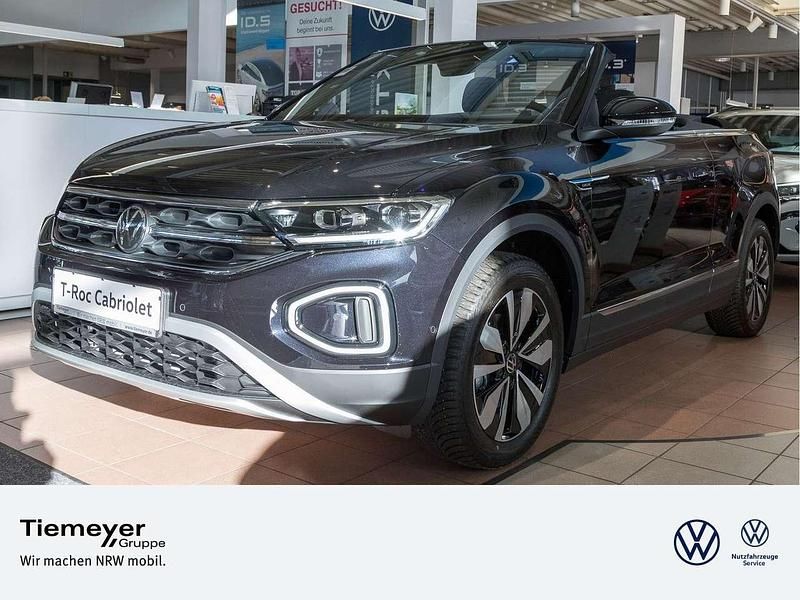 Deep black perleffekt Gebraucht 2024 VW T-Roc Cabriolet Move Cabrio | 27.940 € (Superpreis) - Bild 1/4