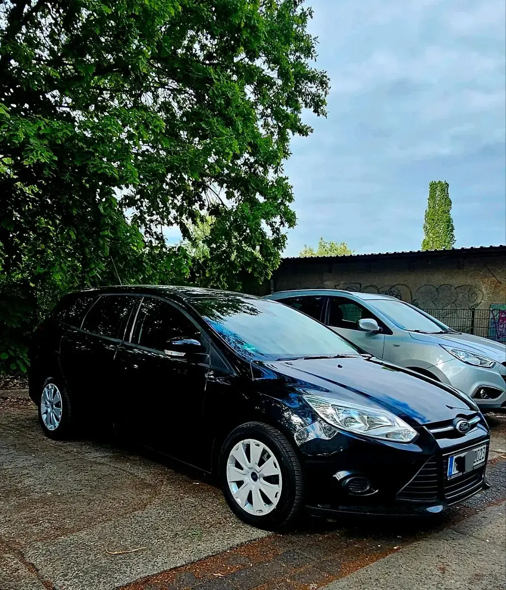 Używany Ford Focus 96 KM (70 kW) 2014 Czarny Kombi