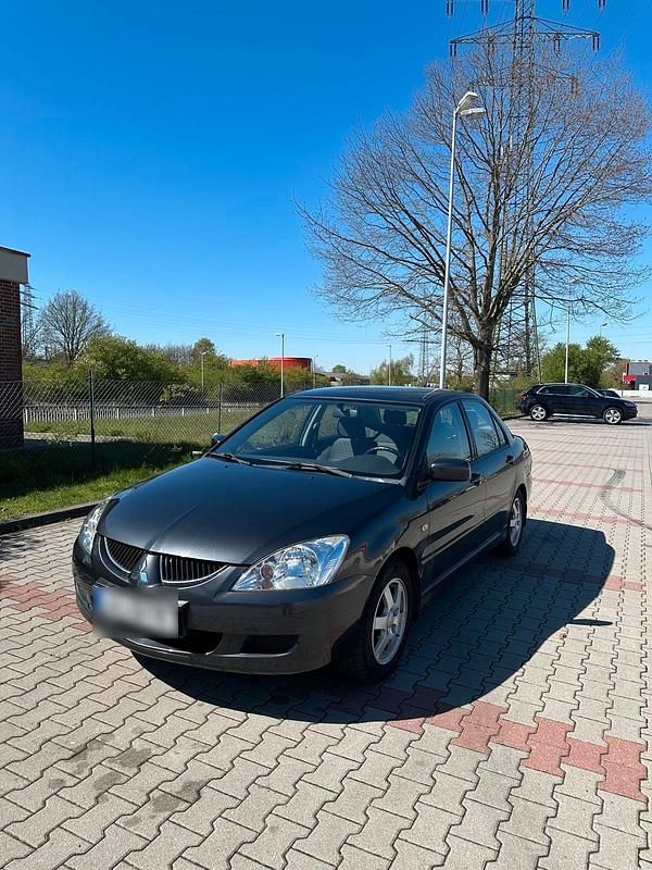 Second-hand Mitsubishi Lancer 98 CP (72 kW) 2004 Gri Berlinǎ