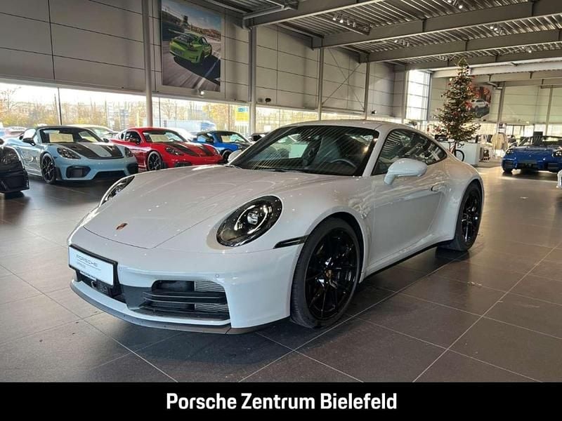 Weiss Gebraucht 2024 Porsche 911 Carrera Coupé | 134.700 € - Bild 1/4