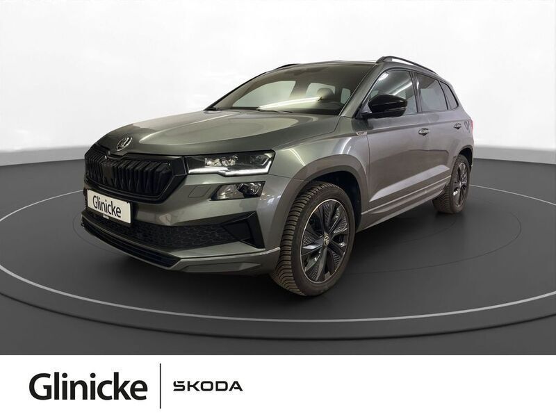 Graphitegrau metallic Gebraucht 2023 Skoda Karoq SportLine SUV | 37.880 € (Fairer Preis) - Bild 1/4