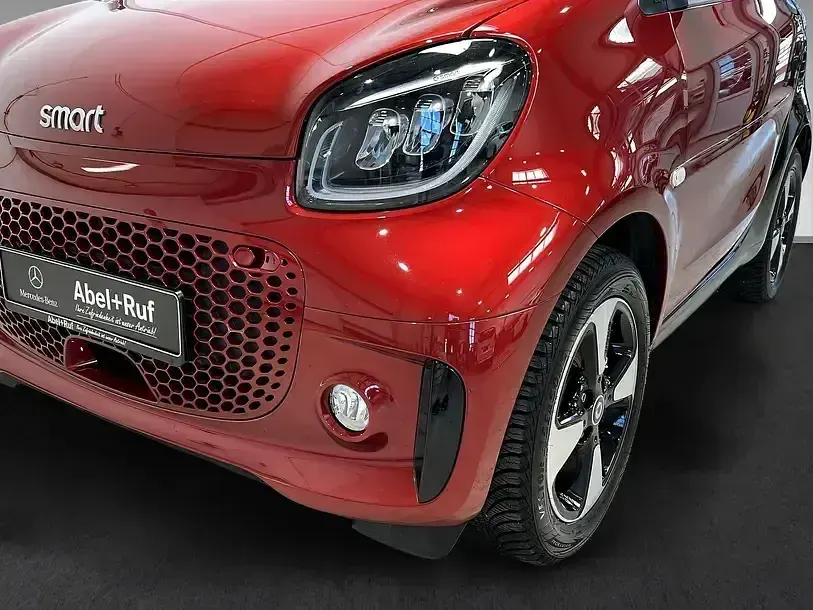 Gebraucht Smart ForTwo Electric Drive Passion 60 kW (82 PS) 2024 Bodypanels in carmine red (metal (metallic) Coupé