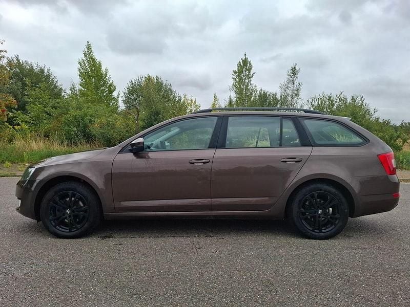 Gebraucht Skoda Octavia Ambition 105 PS (77 kW) 2014 Braun Kombi