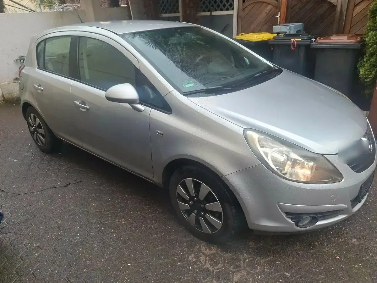 Używany Opel Corsa 80 KM (58 kW) 2009 Srebrny Hatchback