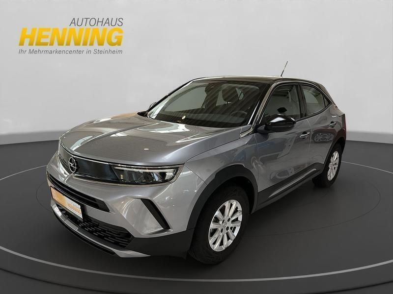 Grau Gebraucht 2023 Opel Mokka Enjoy SUV | 17.895 € (Superpreis) - Bild 1/4