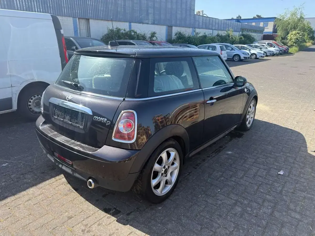 Gebraucht Mini Cooper D 111 PS (81 kW) 2013 Iced chocolate metallic Kleinwagen