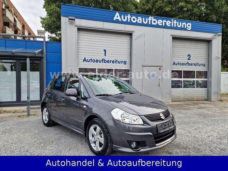 Grau Gebraucht 2009 Suzuki SX4 City SUV | 6.950 € (Fairer Preis) - Bild 1/4