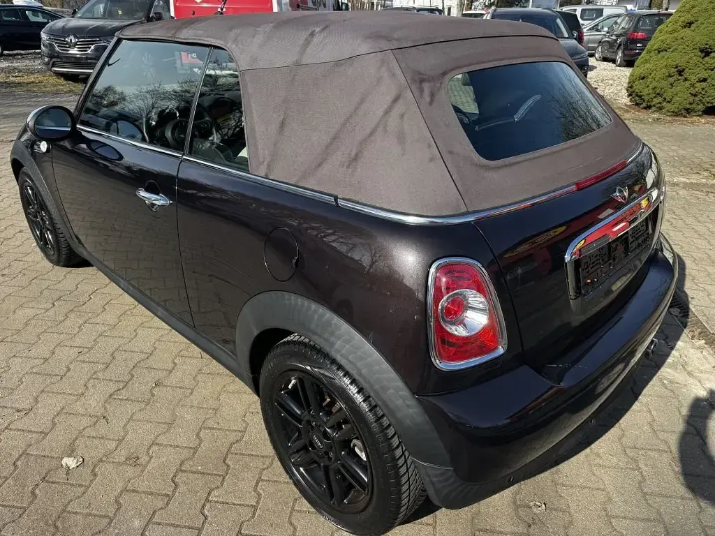 Gebraucht Mini Cooper Cabriolet 122 PS (89 kW) 2015 Iced chocolate (metallic) Cabrio