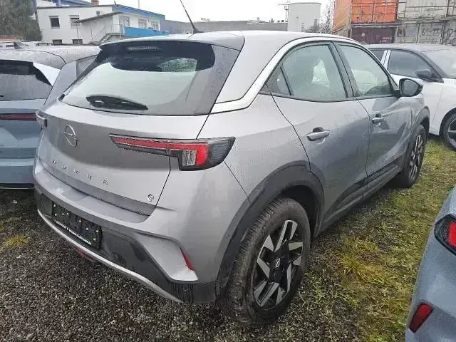 Gebraucht Opel Mokka-e Elegance 100 kW (136 PS) 2023 Grau metallic SUV