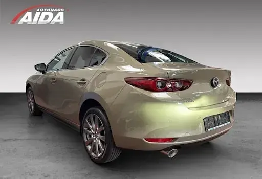 Neu Mazda 3 Exclusive-Line 186 PS (136 kW) 2025 Beige Limousine