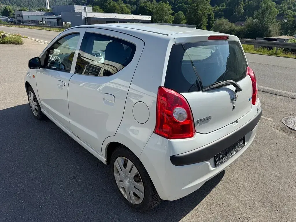 Gebraucht Nissan Pixo Acenta 68 PS (50 kW) 2011 Weiß Kleinwagen