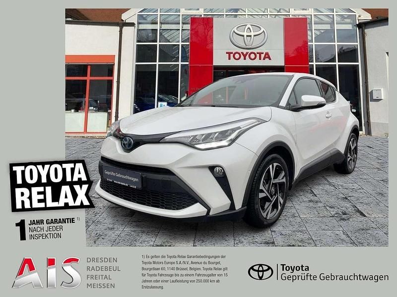 Platinum white pearl mc. Gebraucht 2022 Toyota C-HR Team SUV | 23.680 € (Fairer Preis) - Bild 1/3