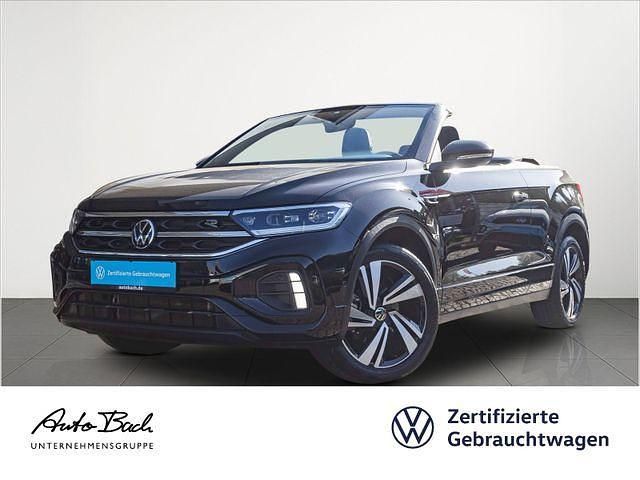 Schwarz (deep black perleffekt/schwarz) Gebraucht 2022 VW T-Roc Cabriolet R-line Cabrio | 29.740 € (Fairer Preis) - Bild 1/4