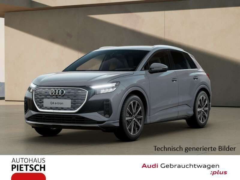 Grau Gebraucht 2024 Audi Q4 e-tron Advanced SUV | 46.490 € (Superpreis) - Bild 1/2