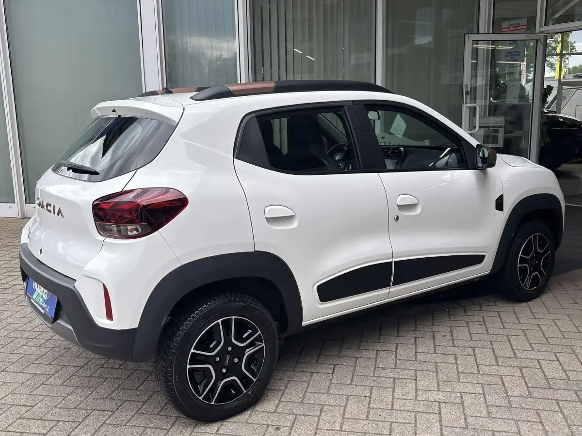 Gebraucht Dacia Spring Extreme 47 kW (65 PS) 2023 Weiß Kleinwagen