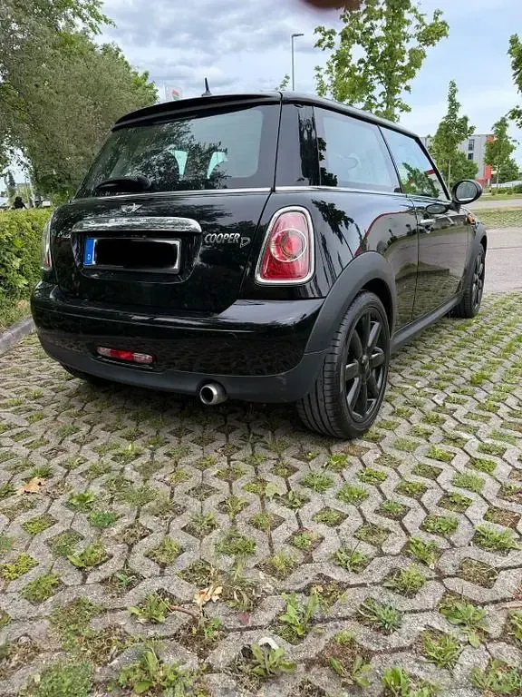 Gebraucht Mini Cooper D 111 PS (81 kW) 2011 Schwarz Kleinwagen