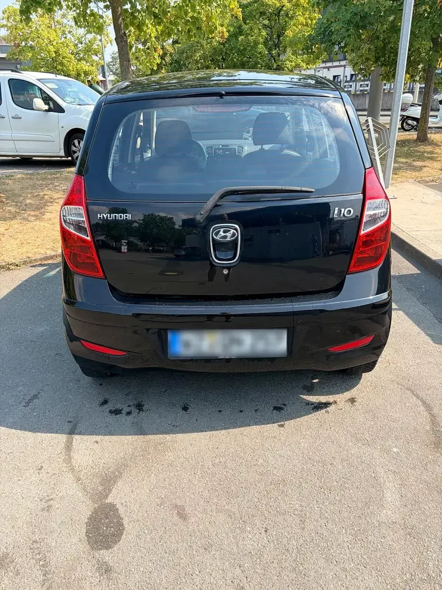 Gebraucht Hyundai i10 69 PS (50 kW) 2011 Schwarz Kleinwagen