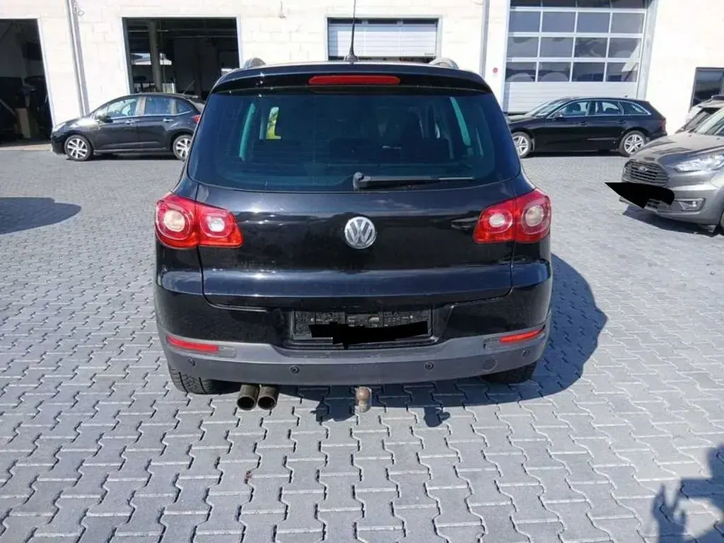 Gebraucht VW Tiguan Team 170 PS (125 kW) 2011 Schwarz SUV