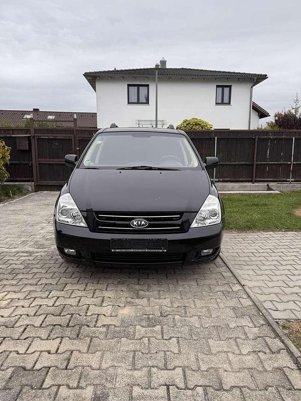 Schwarz Gebraucht 2009 Kia Carnival Basis Van / Kleinbus | 3.999 € (Fairer Preis) - Bild 1/4