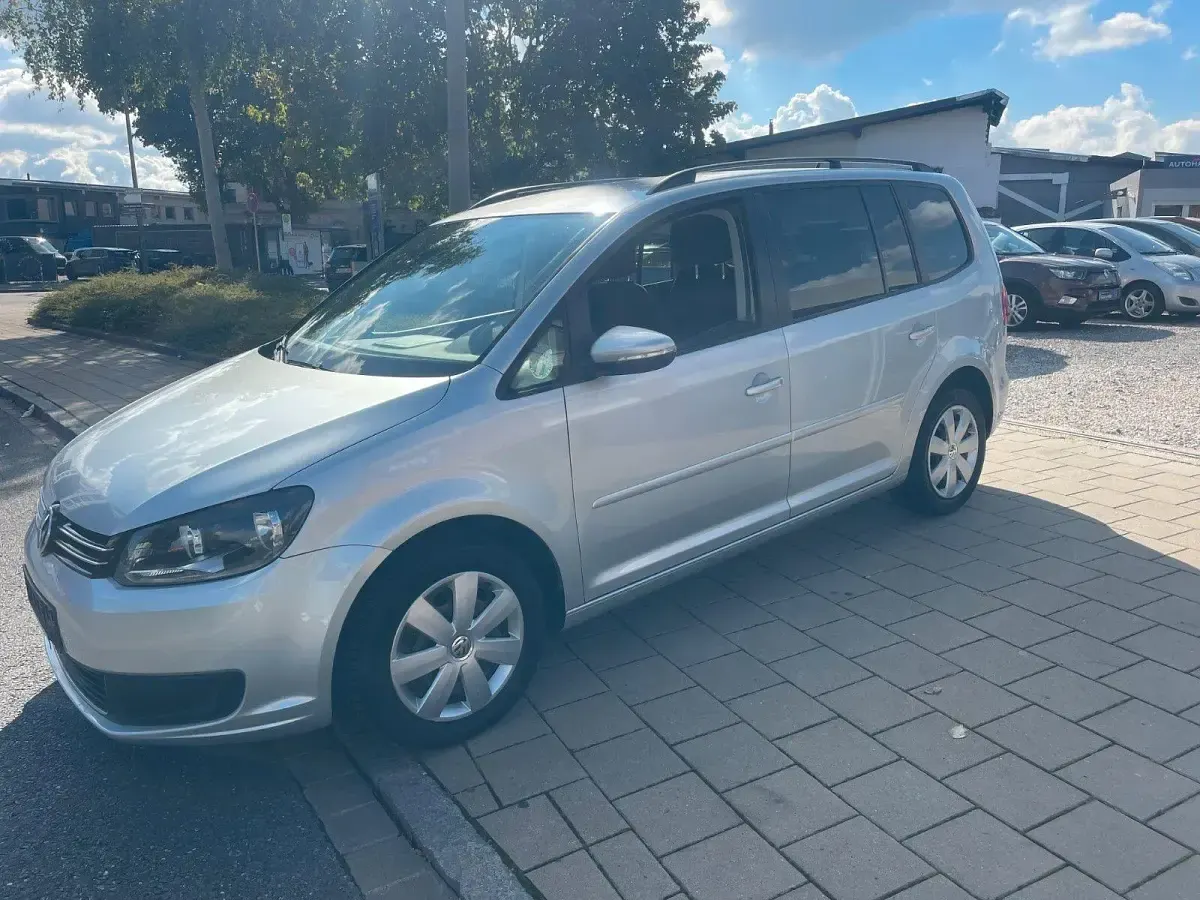 Gebraucht VW Touran Comfortline 140 PS (102 kW) 2013 Silber Van / Kleinbus