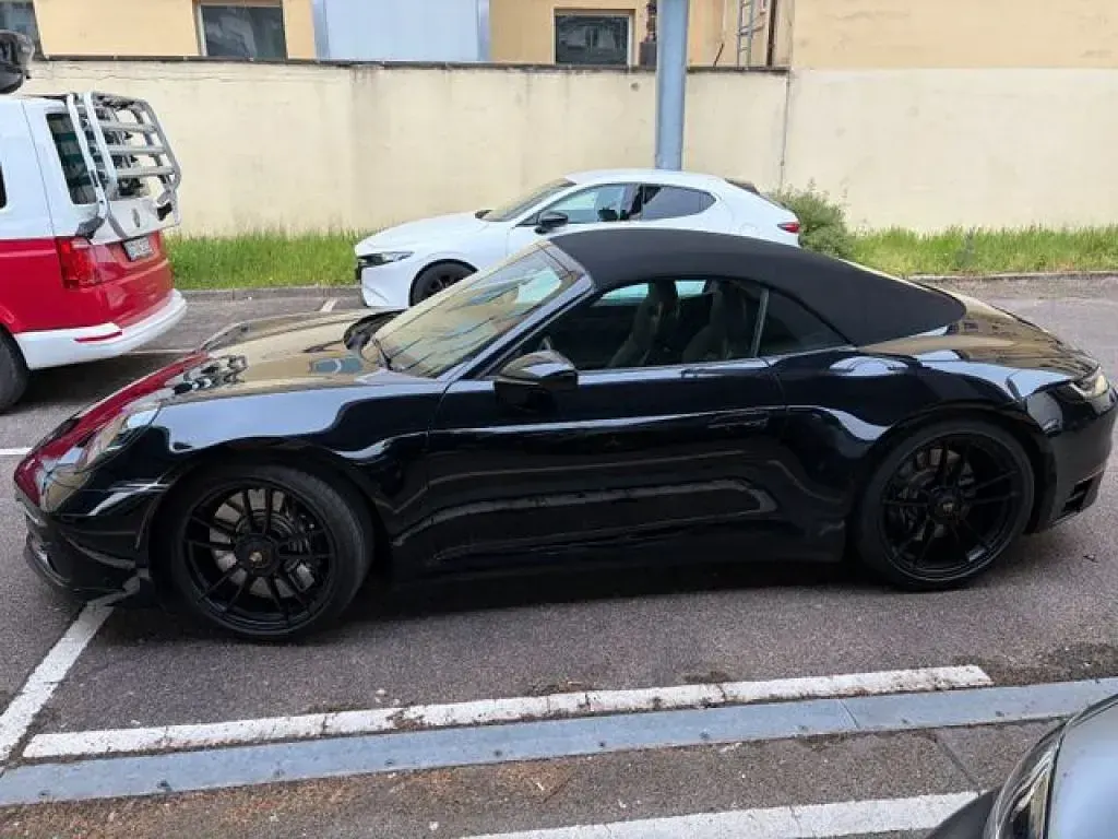 Gebraucht Porsche 992 480 PS (353 kW) 2023 Tiefschwarz (metallic) Cabrio