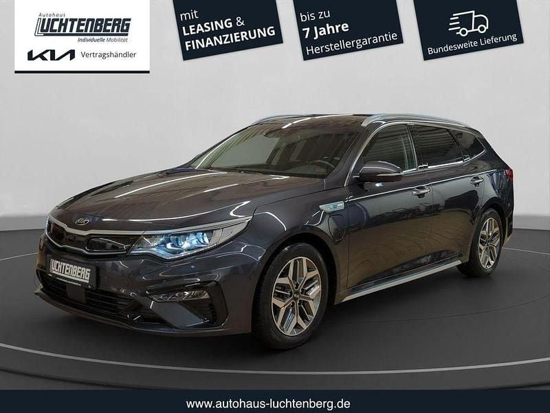 Grau Gebraucht 2019 Kia Optima Hybrid Spirit Limousine | 19.950 € (Fairer Preis) - Bild 1/4