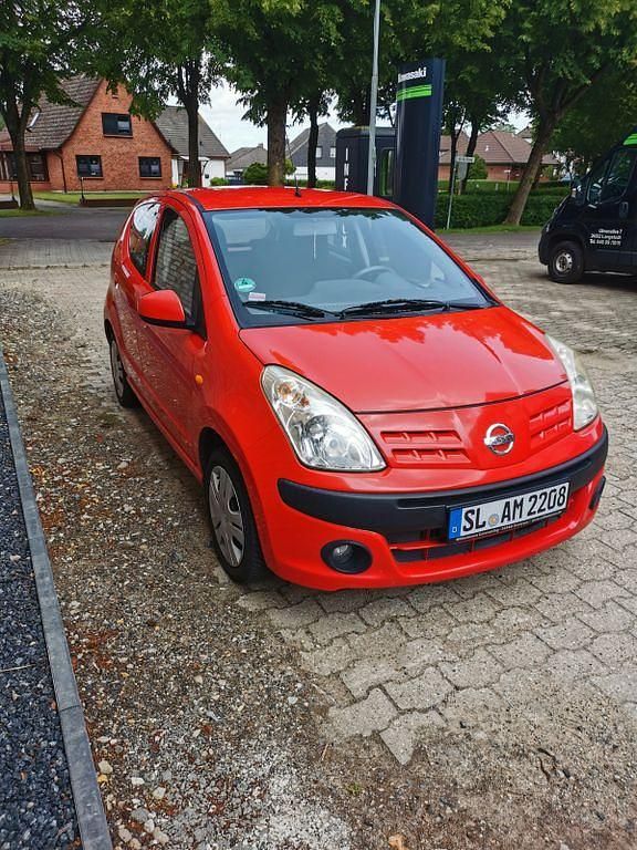 Rot Gebraucht 2009 Nissan Pixo Kleinwagen | 2.899 € - Bild 1/4