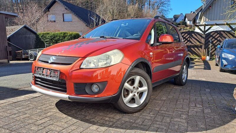 Orange Gebraucht 2006 Suzuki SX4 Comfort Limousine | 3.200 € (Fairer Preis) - Bild 1/4