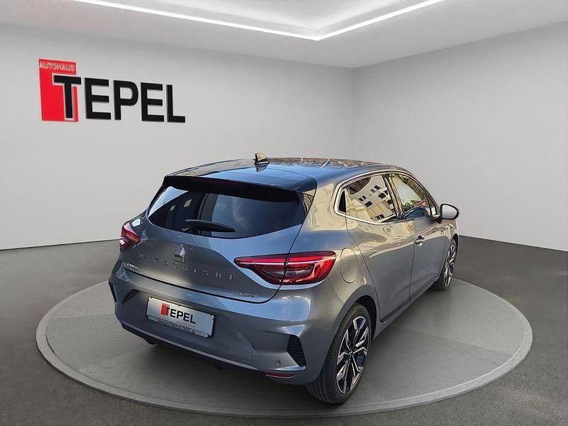 Gebraucht Mitsubishi Colt Select 143 PS (105 kW) 2024 Grau Limousine