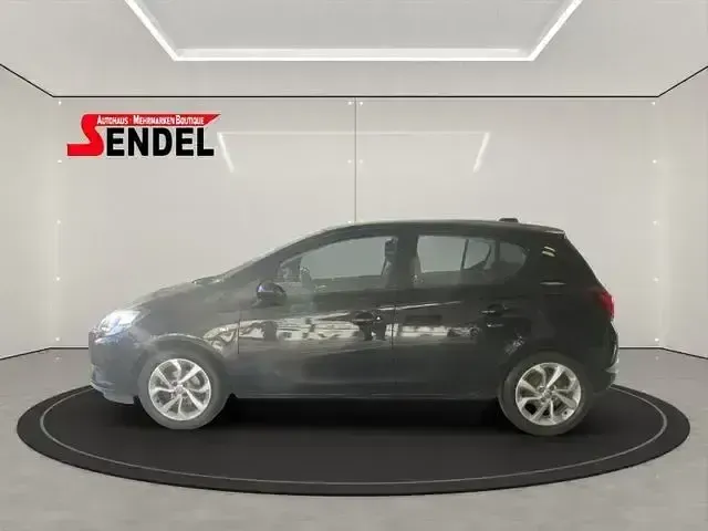Używany Opel Corsa Active 101 KM (74 kW) 2017 Czarny Sedan/Limuzyna