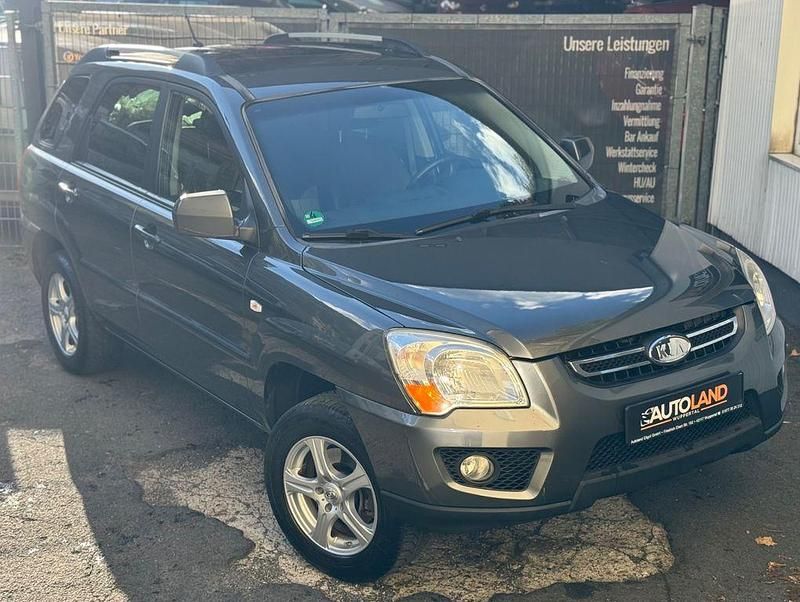 Grau Gebraucht 2010 Kia Sportage 2 SUV | 6.999 € (Fairer Preis) - Bild 1/4