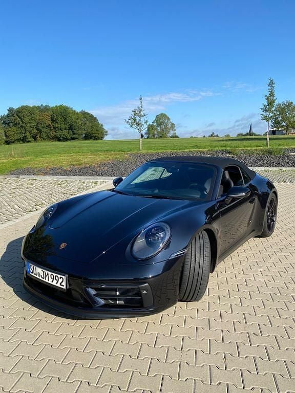 Schwarz Gebraucht 2022 Porsche 911 Carrera 4 Cabriolet Cabrio | 155.911 € (Guter Preis) - Bild 1/4