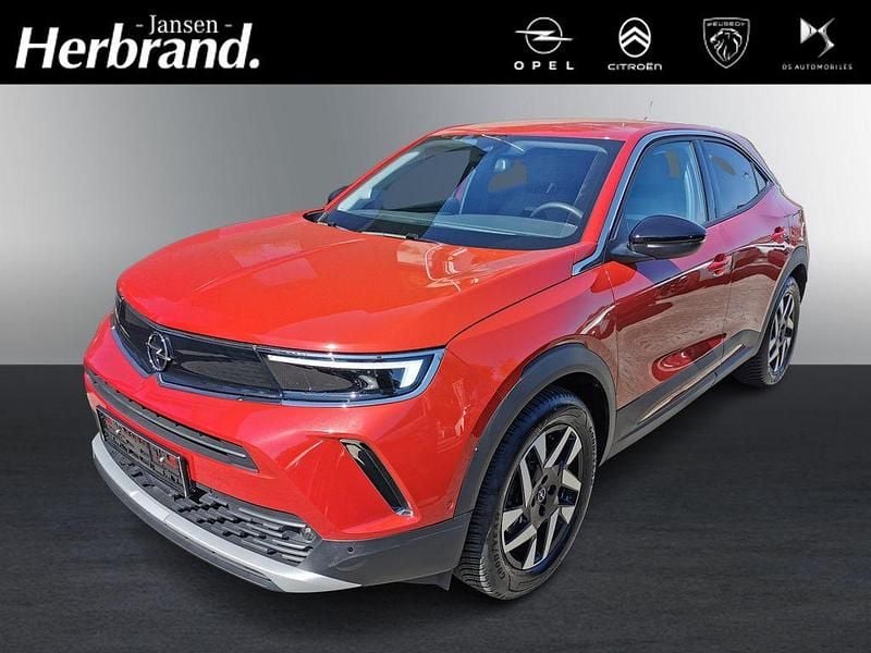 Power rot/kosmos rot Gebraucht 2022 Opel Mokka-e Elegance SUV | 19.390 € (Fairer Preis) - Bild 1/4