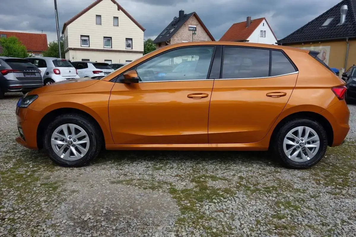 Gebraucht Skoda Fabia Selection 116 PS (85 kW) 2024 Phoenixorange metallic Kleinwagen