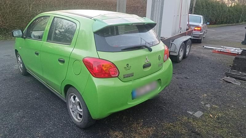 Gebraucht Mitsubishi Space Star 71 PS (52 kW) 2014 Grün Van / Kleinbus