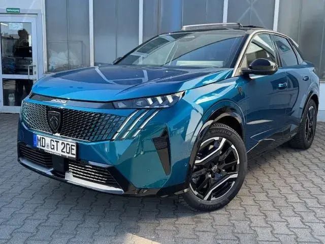 Obsession blau metallic Gebraucht 2024 Peugeot e-3008 GT SUV | 52.800 € (Etwas zu teuer) - Bild 1/4