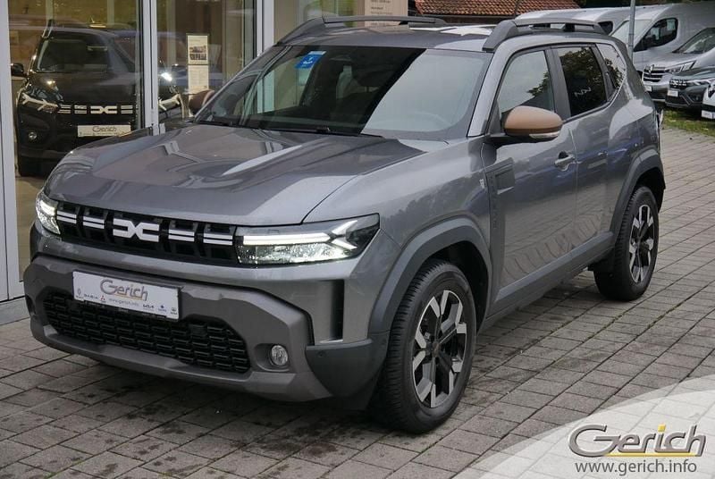 Dolomitgrau metallic Gebraucht 2024 Dacia Duster Extreme SUV | 22.490 € (Guter Preis) - Bild 1/4