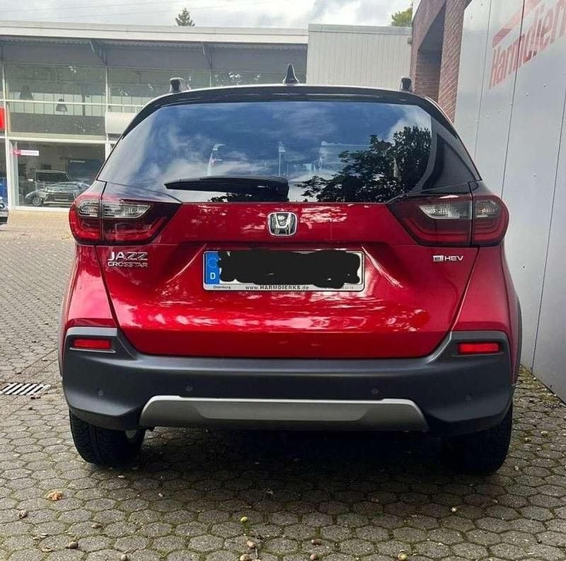 Gebraucht Honda Jazz Advance 122 PS (89 kW) 2023 Premium crystal red metallic (metallic) Kleinwagen