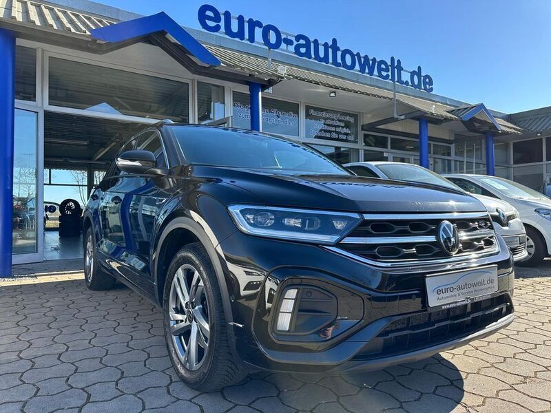 Deep black perleffekt (metallic) Gebraucht 2023 VW T-Roc R-line SUV | 28.990 € (Fairer Preis) - Bild 1/4