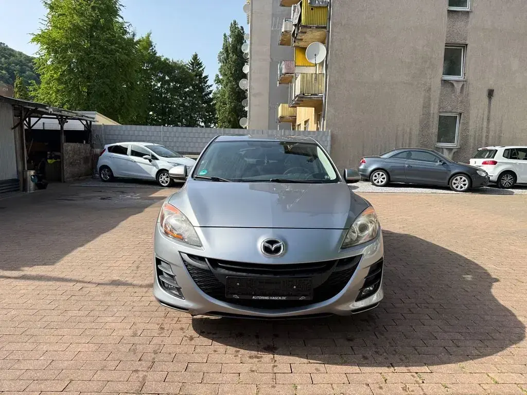 Używany Mazda 3 Exclusive-Line 116 KM (85 kW) 2011 Szary Sedan/Limuzyna
