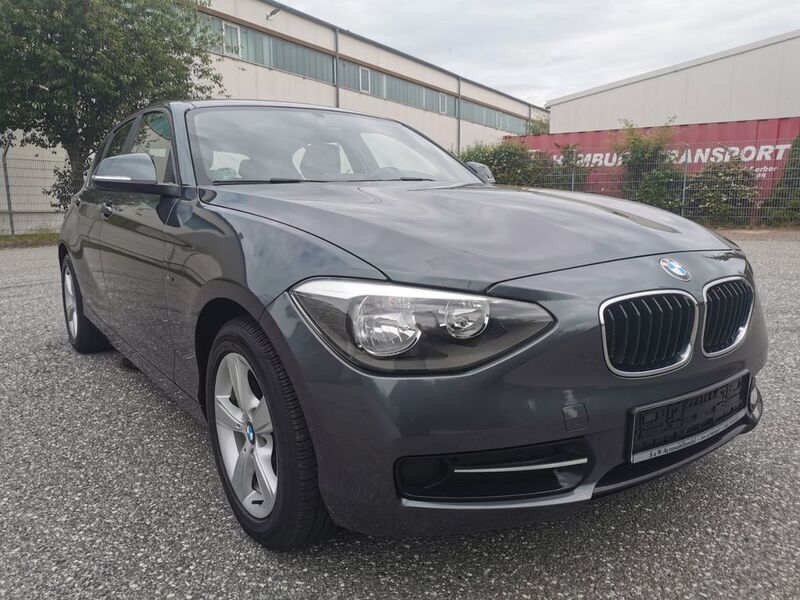 Grau Gebraucht 2012 BMW 116 Sport Line Kleinwagen | 7.999 € (Guter Preis) - Bild 1/4