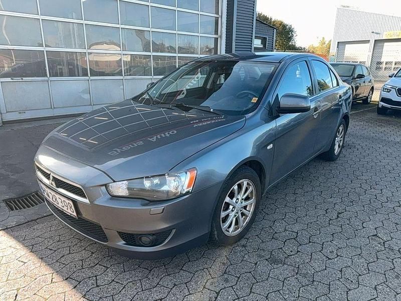 Grau Gebraucht 2012 Mitsubishi Lancer Limousine | 1.250 € - Bild 1/4