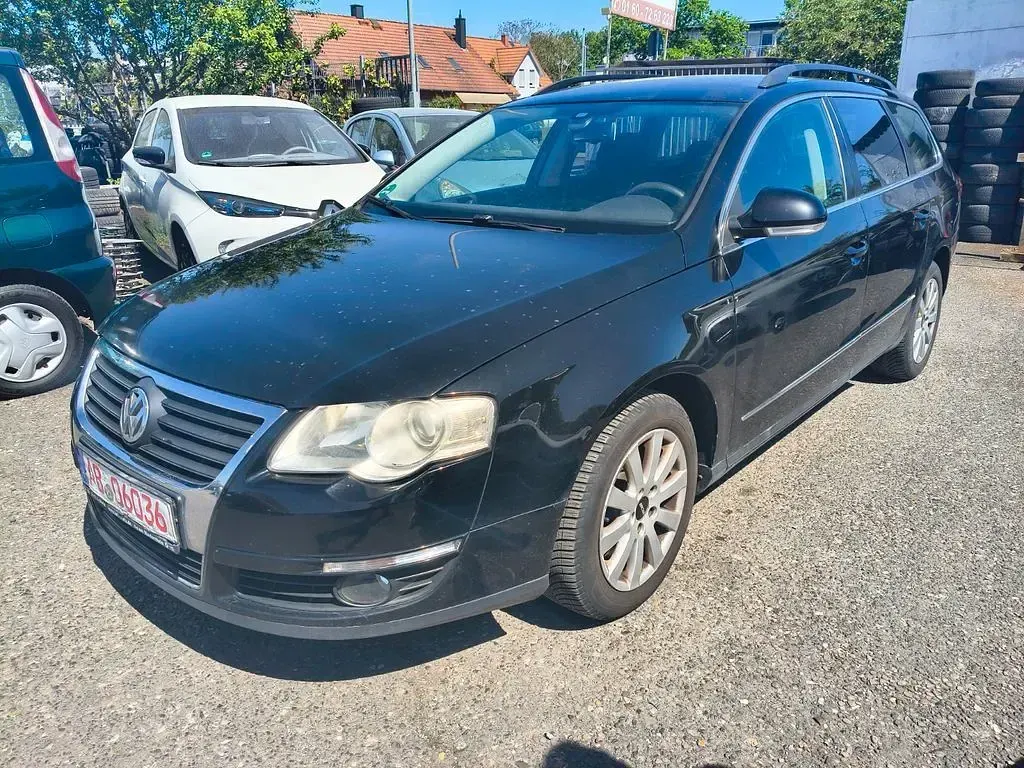 Second-hand VW Passat 140 CP (102 kW) 2009 Negru Break