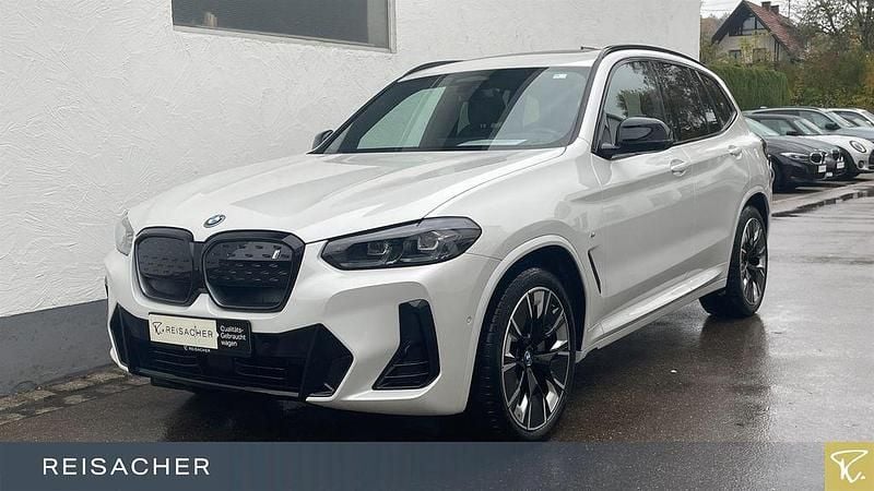 Mineralweiß metallic Gebraucht 2024 BMW iX3 Impressive SUV | 52.349 € (Guter Preis) - Bild 1/4