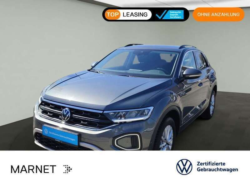 Indiumgrau metallic Gebraucht 2024 VW T-Roc Life SUV | 22.430 € (Fairer Preis) - Bild 1/3