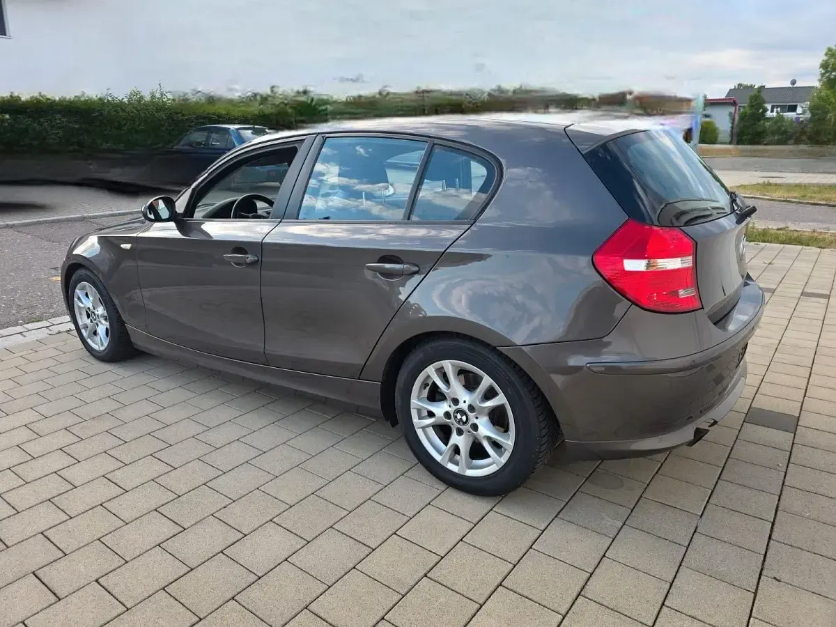 Gebraucht BMW 116 122 PS (89 kW) 2009 Braun Kleinwagen
